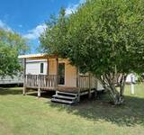 mobil-home ombragé au Camping Paradis Le Tastesoule